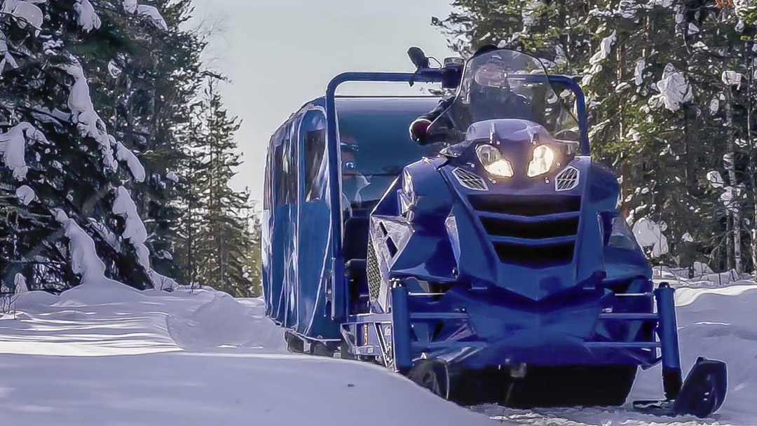 Alpina high-efficiency eco-friendly utility snowmobile working on deep snow